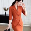 41C4VUXhqL.jpg Women's Spring and Summer Solid Lapel Double-Breasted Half-Sleeved Suit Skirt Set