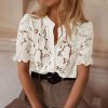 41LACQyk-XL.jpg Womens 2025 Spring Lace Tops Short Puff Sleeve Casual Dressy Blouses Eyelet Crew Neck Button Down Shirts